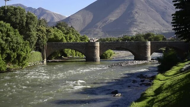 Tingo bridge   of the city of Hu&aacute;nuco, Peru, detail shot historic ,river huallaga  year 1884