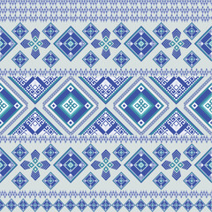 Obraz premium Seamless geometric ethnic pattern vector design featuring symmetrical tribal-inspired motifs, bold lines, and repeating shapes. Perfect for fabric prints, wallpapers, digital backgrounds, and ethnic-t
