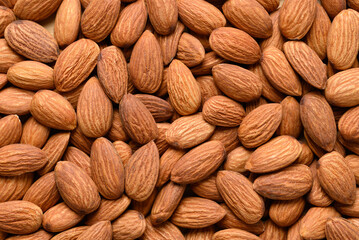 Raw almond nut seed texture background, Food ingredient, Top view