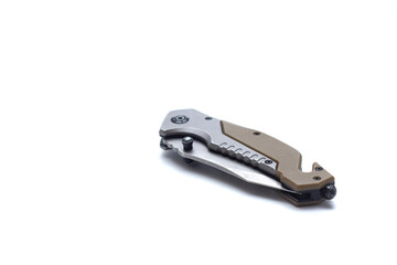 Tactical folding knife with its durable blade and compact design. Reliable tool for camping, hiking, and survival tasks.