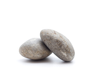 Smooth gray pebble stones with natural texture for nature photography and minimalist design projects.