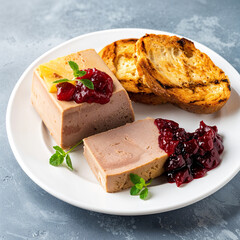 FOIE GRAS TERRINE Homemade Foie Gras, Pineapple Jam, Berry Jam, Toasted Brioche