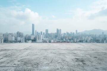 Concrete floor with a blurred cityscape in the background.