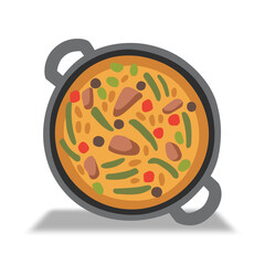 Overhead view of a pan of paella, a traditional Spanish rice dish.