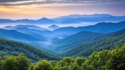 Obraz premium Misty mountain range at sunrise