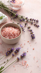 Spa Flat Lay with Himalayan Pink Salt, Dried Lavender, and Blank Kraft Tag on Soft Pink Background
