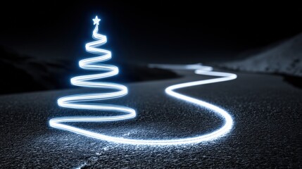 Light-painted Christmas tree on a dark road at night, creating a festive glowing decoration.