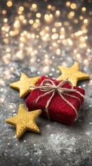 Red gift box with tied string on white background, perfect for holiday or celebration themes.