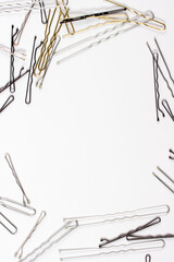 women's invisible hair clips on a white background.  taken in close-up, with a place for text or an object or advertisement