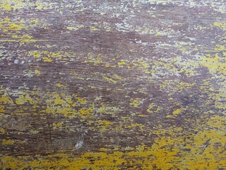 Weathered Wooden Surface with Distressed Gold Paint