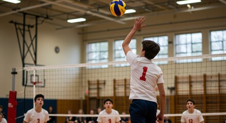 Teenage Boy Volleyball Player Setting Ball Indoors