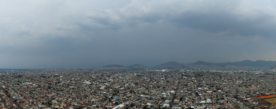 Drone panoramic shots of Ecatepec on a cloudy, gray day, within CDMX 