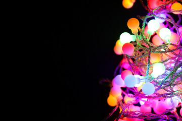 RGB LED multicolored garland lights on black background