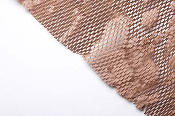 honeycomb cardboard filler for transportation on white background