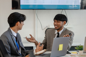 employees are discussing marketing strategies in a conference room, businesspeople are discussing the investment they will make together, accounting, brainstorming, finance