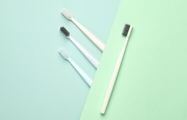 Plastic toothbrushes on a pastel background. Creative layout, Minimalism