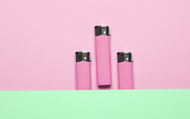 Lighters on pastel background. Minimalism.
