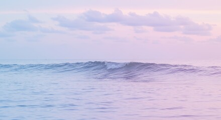 Obraz premium Serene Pastel Ocean Wave at Sunset