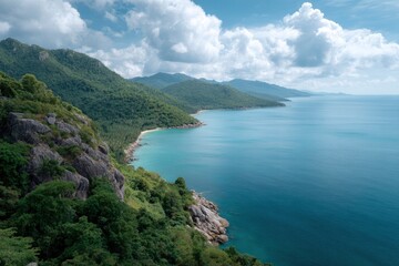 Obraz premium Coastal Landscape with Lush Green Hills and Blue Sea