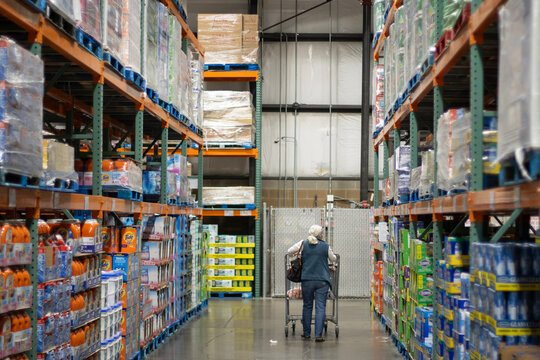 Tigard, OR, USA - May 14, 2025: The aisle for laundry detergents and other cleaning products in the household supplies section at a Costco warehouse store in Tigard, Oregon.