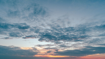 sunset sky background in Thailand,Cloudscape time lapse background Dark red purple sunset sky Nature background, sunset in the clouds.