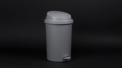 Obraz premium Grey Plastic Pedal Bin: Minimalist Home Waste Container