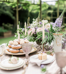 Wedding buffet table with lavender and a variety of dishes.