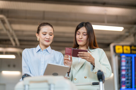 Travel blogger checking passport and hold tablet at airport terminal, travel planning and documentation, vacation journey preparation, modern digital lifestyle in airport check in, travel insurance