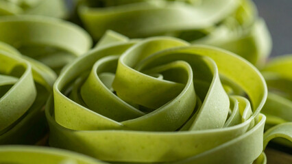 Green Silicone Noodle Utensil &ndash; Flexible Cooking Tool Isolated on White