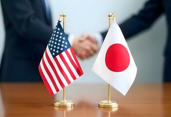 United States and Japan Flags Representing Diplomatic Relations with Friendly Handshake