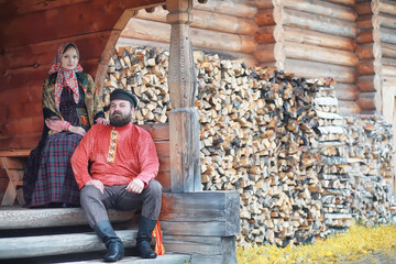 Traditional Slavic rituals in the rustic style. Outdoor in summer. Slavic village farm. Peasants in...