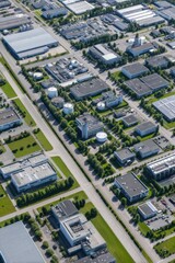 Naklejka premium Aerial view showcasing modern industrial layout, greenery, and o