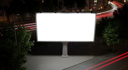 Blank Billboard on Street at Night with Light Trails