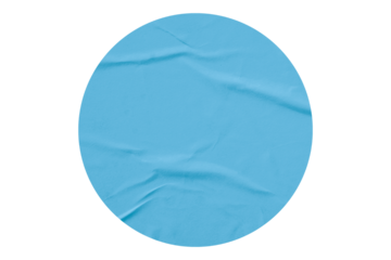 Light blue circle sticker with crumpled edges. Wrinkled round paper isolated on transparent background.