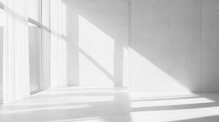 Fototapeta premium Sunlight streams through window in bright white minimalist room.