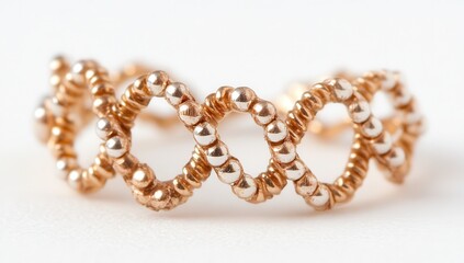 Delicate, gold-toned ring with silver beads