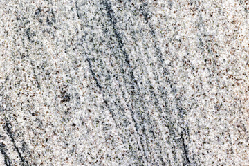 Close-up of granite surface with natural veins and speckles