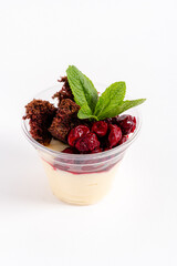 Layers of creamy goodness combined with chocolate cake and tart cherries topped with mint