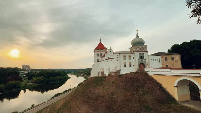 View of the Old Castle on a hill above the Neman River in Grodno. Fortress walls, churches, and a palace. A complex of defensive, religious, and secular structures. Belarus. 4К