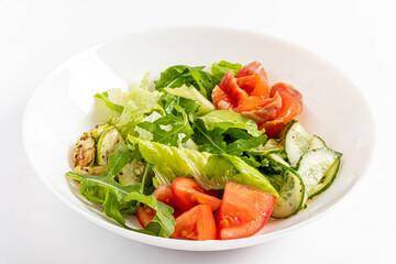 Colorful greens, crisp cucumbers, and juicy tomatoes create a delicious and healthy salad option