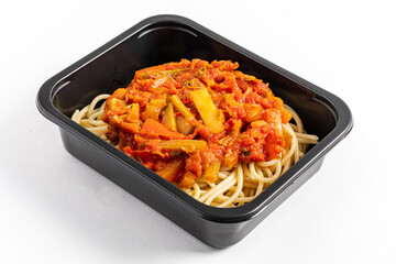 A tempting serving of spaghetti with a rich vegetable sauce invites a hearty meal experience