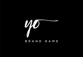Obraz premium YO letter beauty handwriting vector logo.