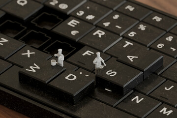 Miniature chefs working on a 3D keyboard in a creative digital art scene