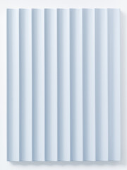 Light softly dances across a blue, ribbed wall, creating a calming, harmonious ambiance