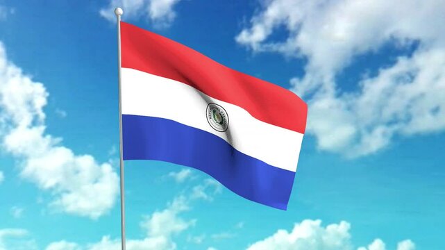 The flag of Paraguay flies against a background of a slightly cloudy blue sky.