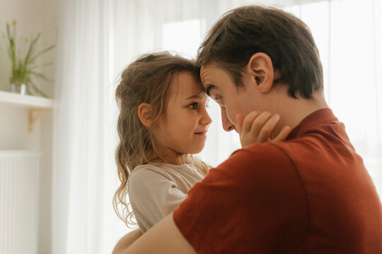 Father and daughter bonding at home with love and trust