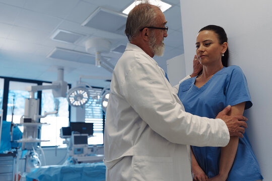Inappropriate behavior between senior doctor and female nurse. Workplace harassment.
