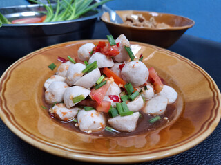 Close up of Thai spicy meatball salad