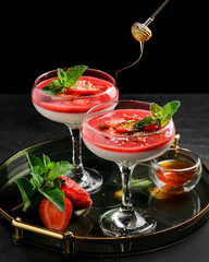 Panna cotta with strawberries and mint