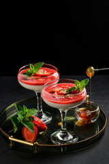 Panna cotta with strawberries and mint